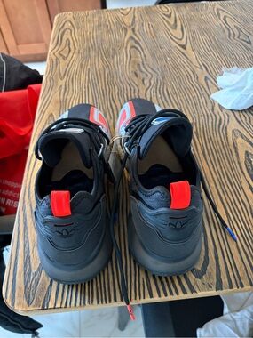 adidas Black Sneakers with Red Pull Tabs and Blue Accents